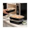 Pactiv Corp. Newspring VERSAtainer 8.8 in. x 6 in. x 2 in. 28 oz. Plastic Microwavable Containers - Black Base/Clear Lid (150/Carton)